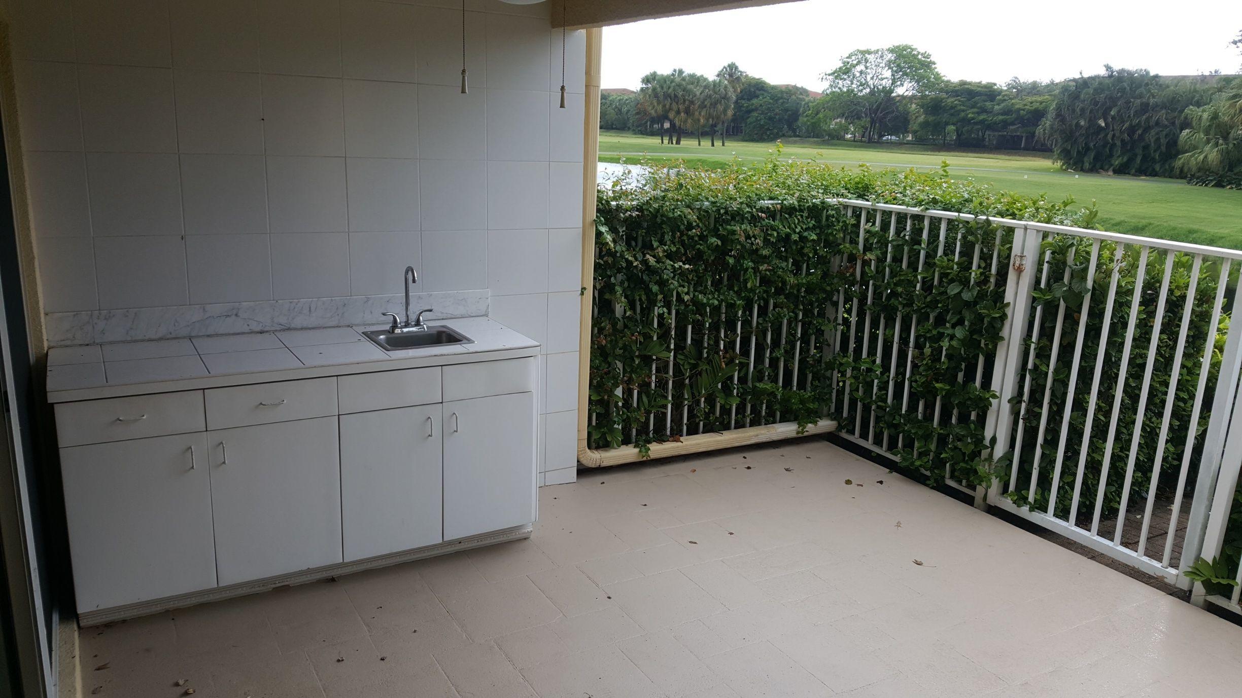 17046 Boca Club Boulevard, Unit 6 Boca Raton, FL 33487 - Photo 15 of 16 a view of a balcony with an outdoor space