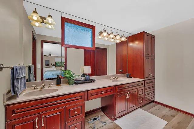 a bathroom with a sink and a mirror