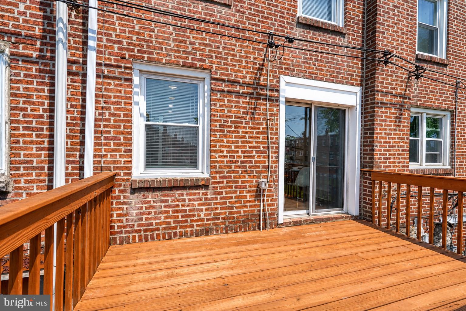 104 Westbridge Road, Unit 120 Glenolden, PA 19036 - Photo 3 of 37 Charming brick facade with a sunny deck.
