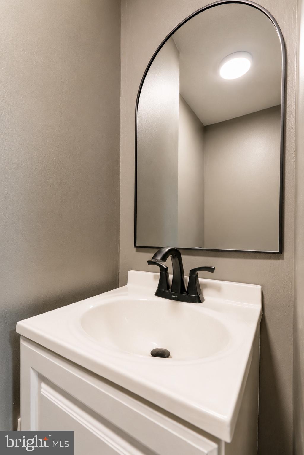 104 Westbridge Road, Unit 120 Glenolden, PA 19036 - Photo 33 of 37 Sleek elegance in a modern bathroom.