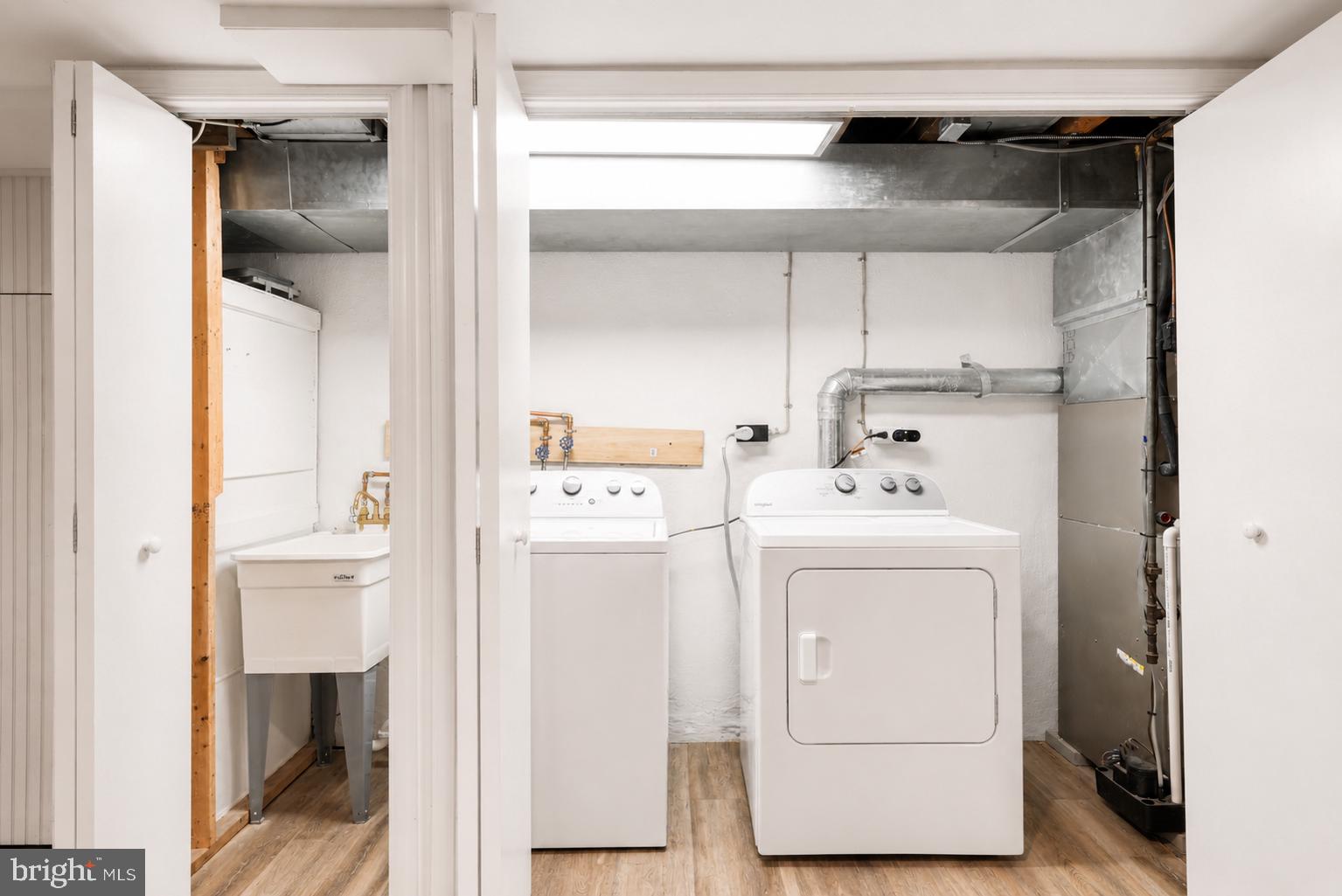 104 Westbridge Road, Unit 120 Glenolden, PA 19036 - Photo 35 of 37 Bright and functional laundry space.