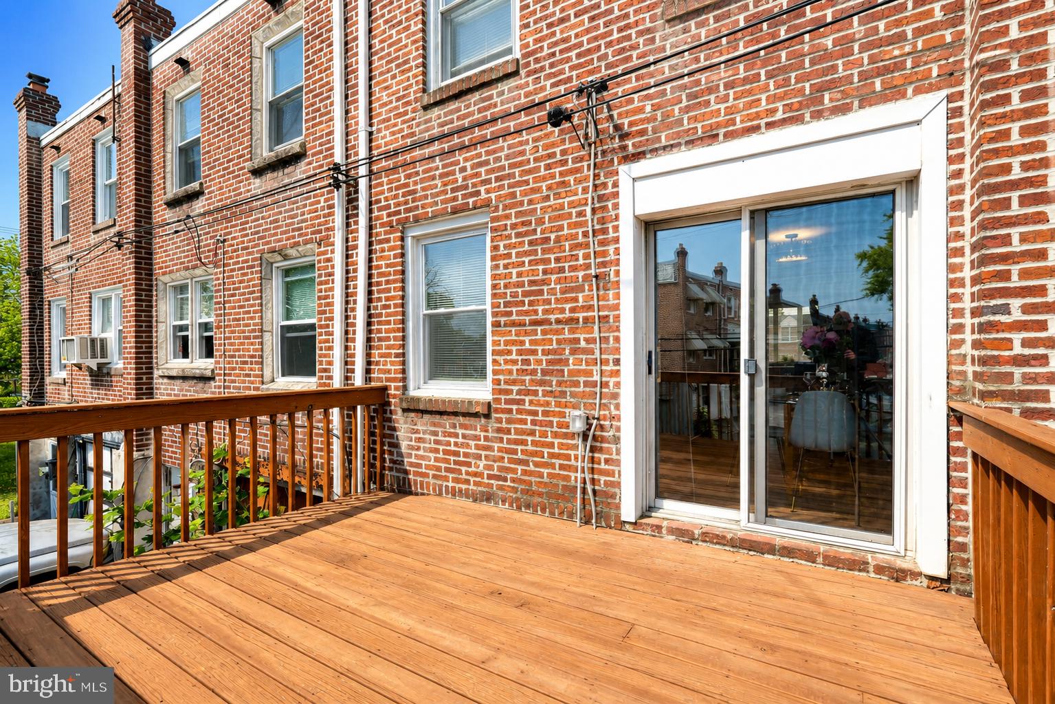 104 Westbridge Road, Unit 120 Glenolden, PA 19036 - Photo 4 of 37 Charming brick facade with inviting deck.