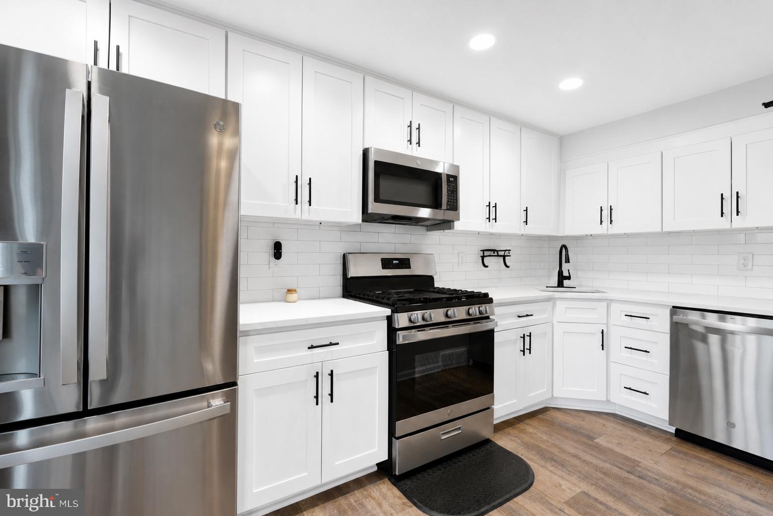 104 Westbridge Road, Unit 120 Glenolden, PA 19036 - Photo 7 of 37 Sleek modern kitchen with stainless steel.