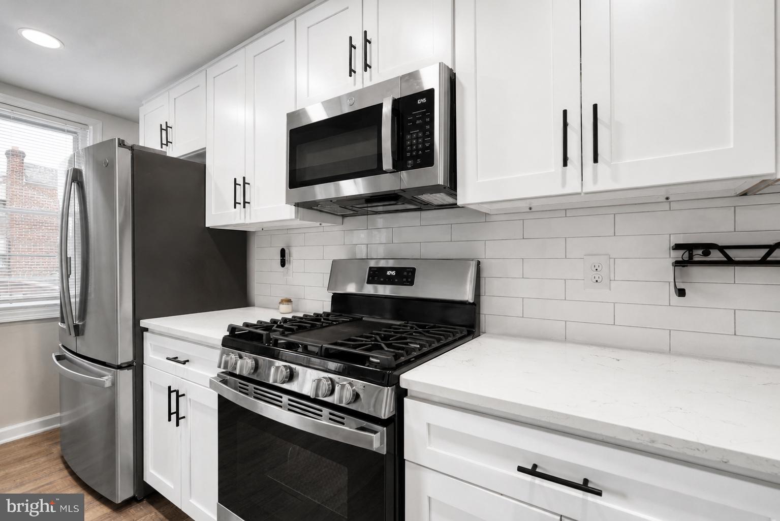 104 Westbridge Road, Unit 120 Glenolden, PA 19036 - Photo 9 of 37 Modern kitchen with sleek finishes.