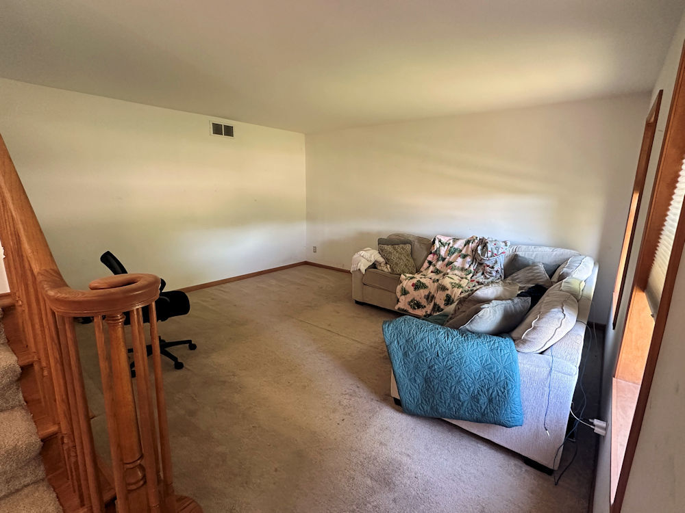 519 South Regulators Street Rochelle, IL 61068 - Photo 5 of 19 a view of a room with wooden floor