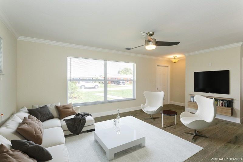 481 West 32nd Street Riviera Beach, FL 33404 - Photo 4 of 18 Living-Staged-481-W-32nd-Street