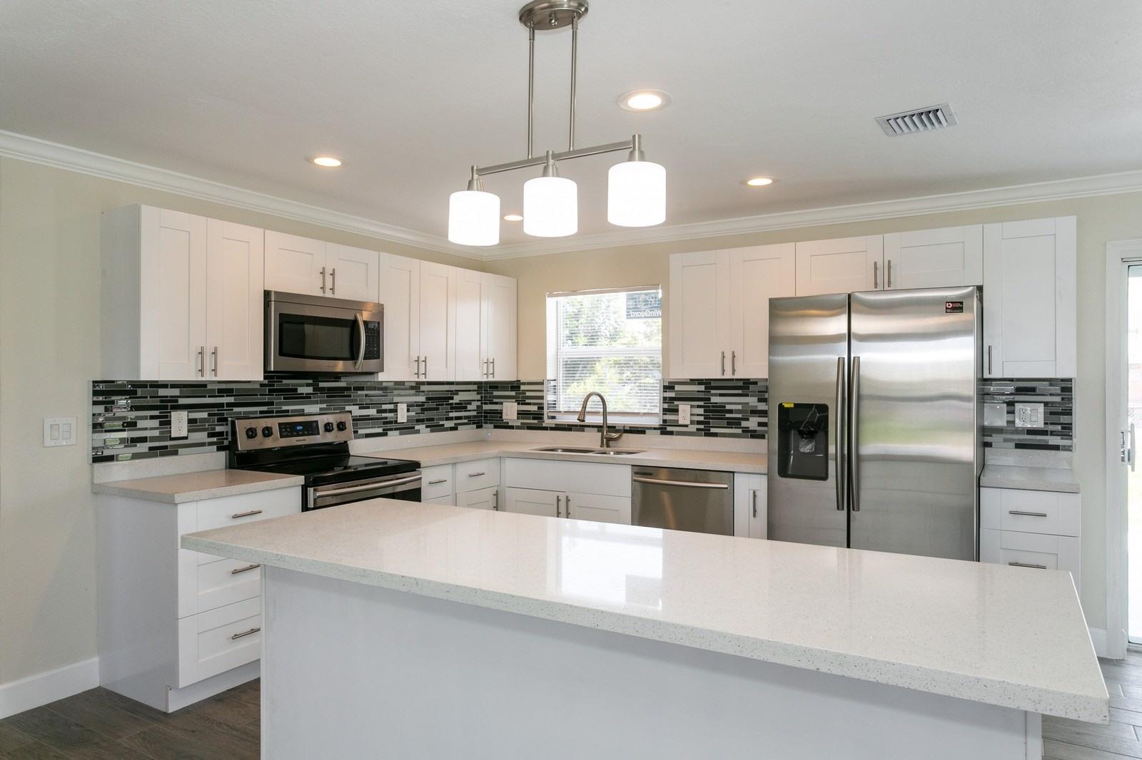 481 West 32nd Street Riviera Beach, FL 33404 - Photo 8 of 18 Kitchen-481-W-32nd-Street