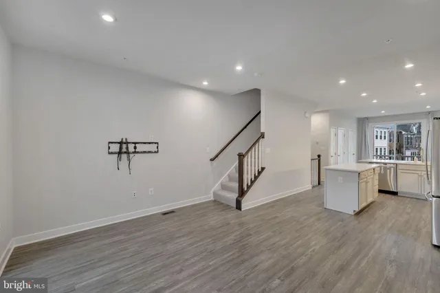 a view of entryway with wooden floor