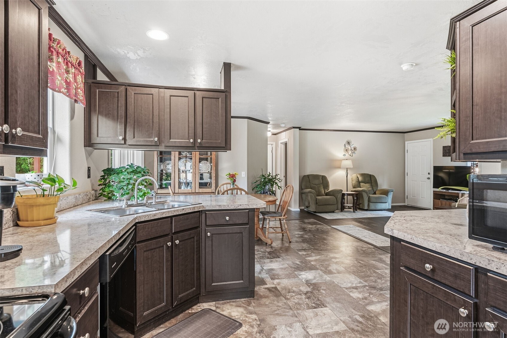 1047 Beaver Creek Road Cathlamet, WA 98612 - Photo 14 of 39 a kitchen with sink cabinets and window
