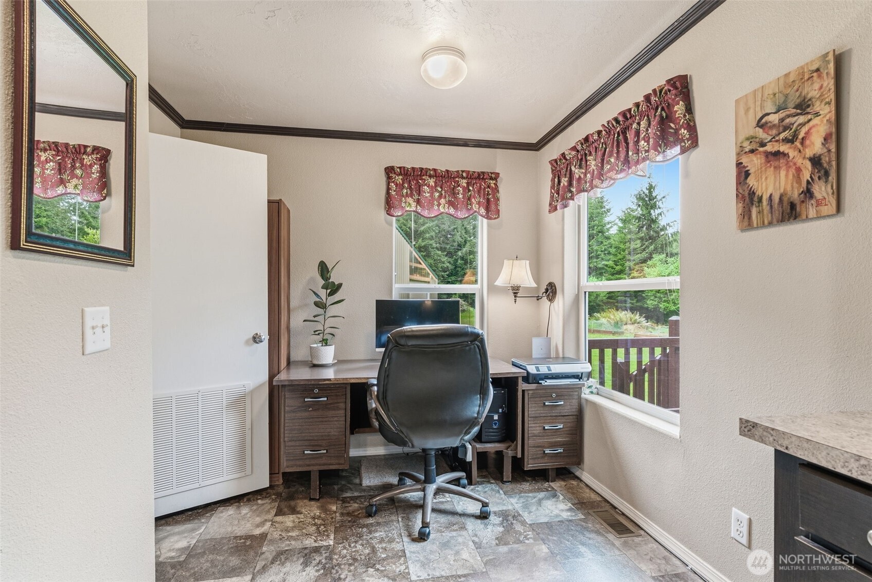 1047 Beaver Creek Road Cathlamet, WA 98612 - Photo 16 of 39 a view of a workspace with furniture and a window