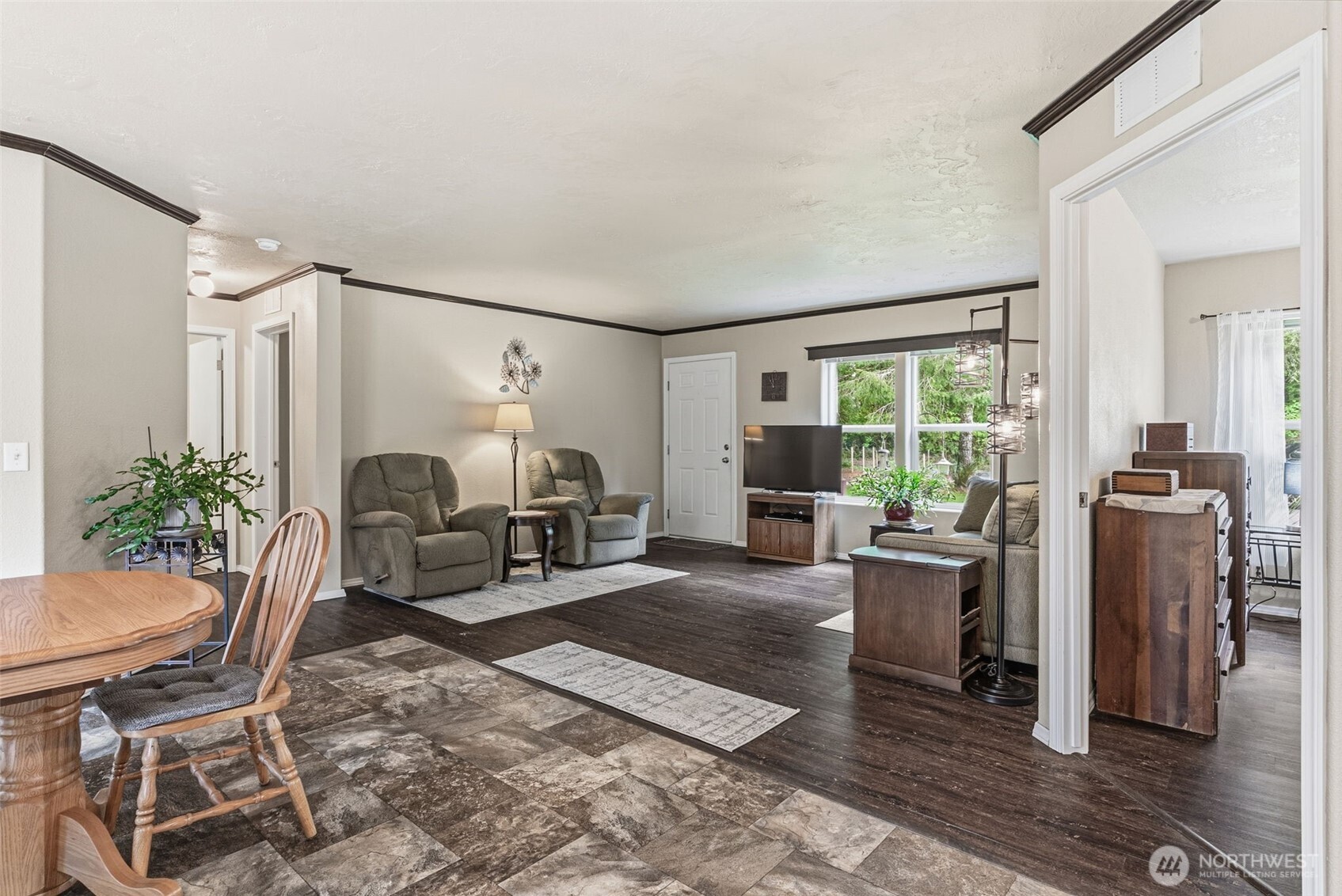 1047 Beaver Creek Road Cathlamet, WA 98612 - Photo 17 of 39 a living room with furniture and a large window