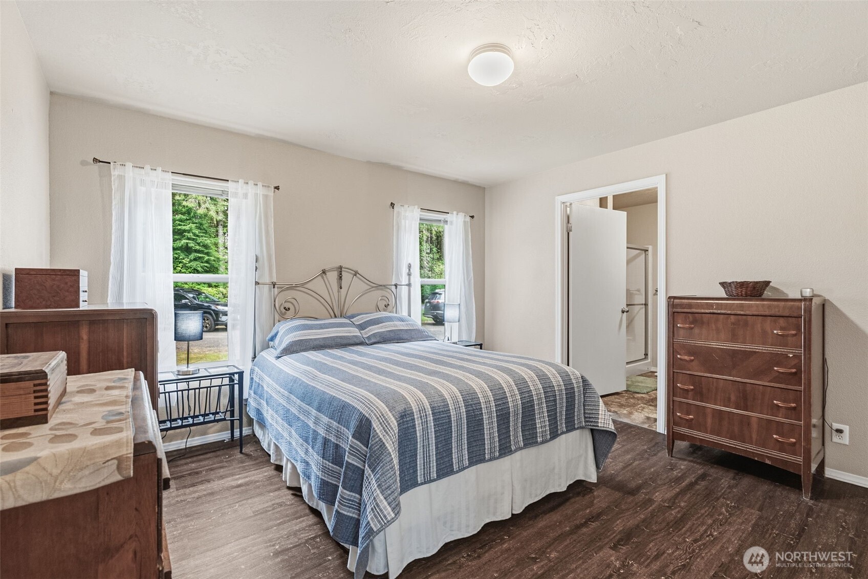 1047 Beaver Creek Road Cathlamet, WA 98612 - Photo 18 of 39 a bedroom with a bed and furniture