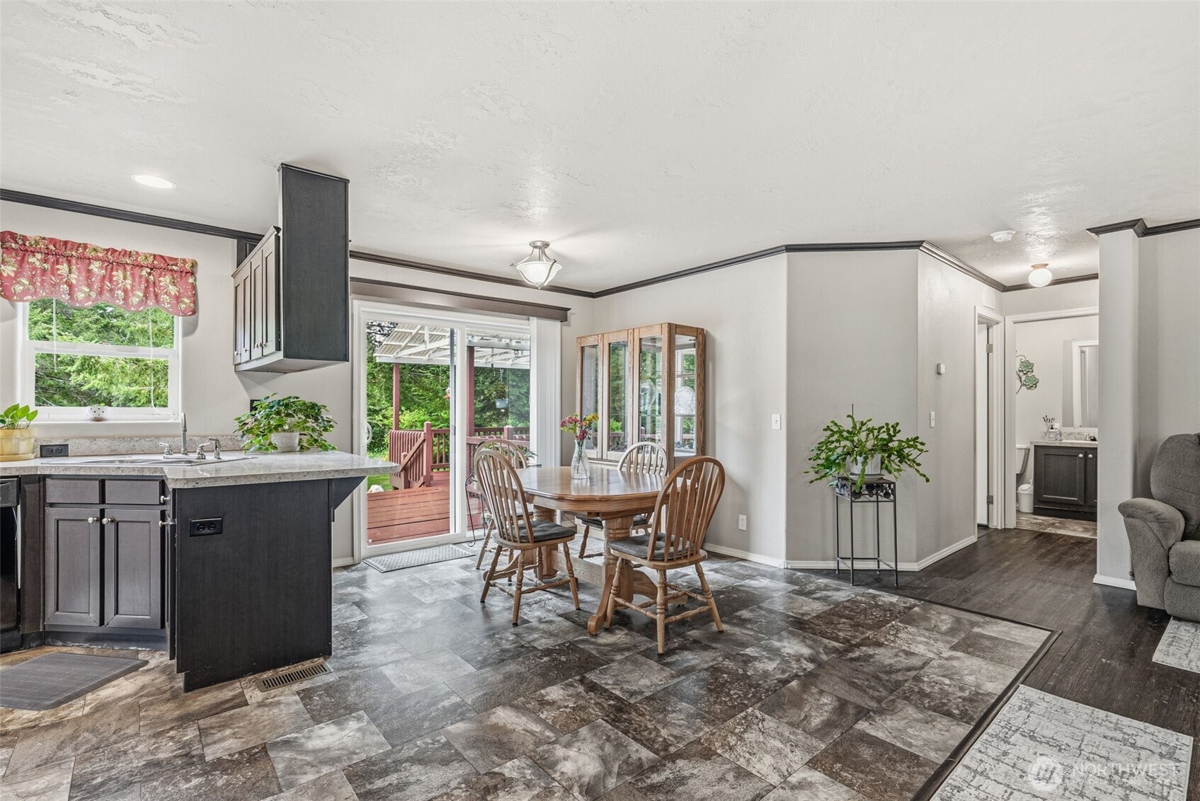 1047 Beaver Creek Road Cathlamet, WA 98612 - Photo 21 of 39 a dining room with a table and chairs