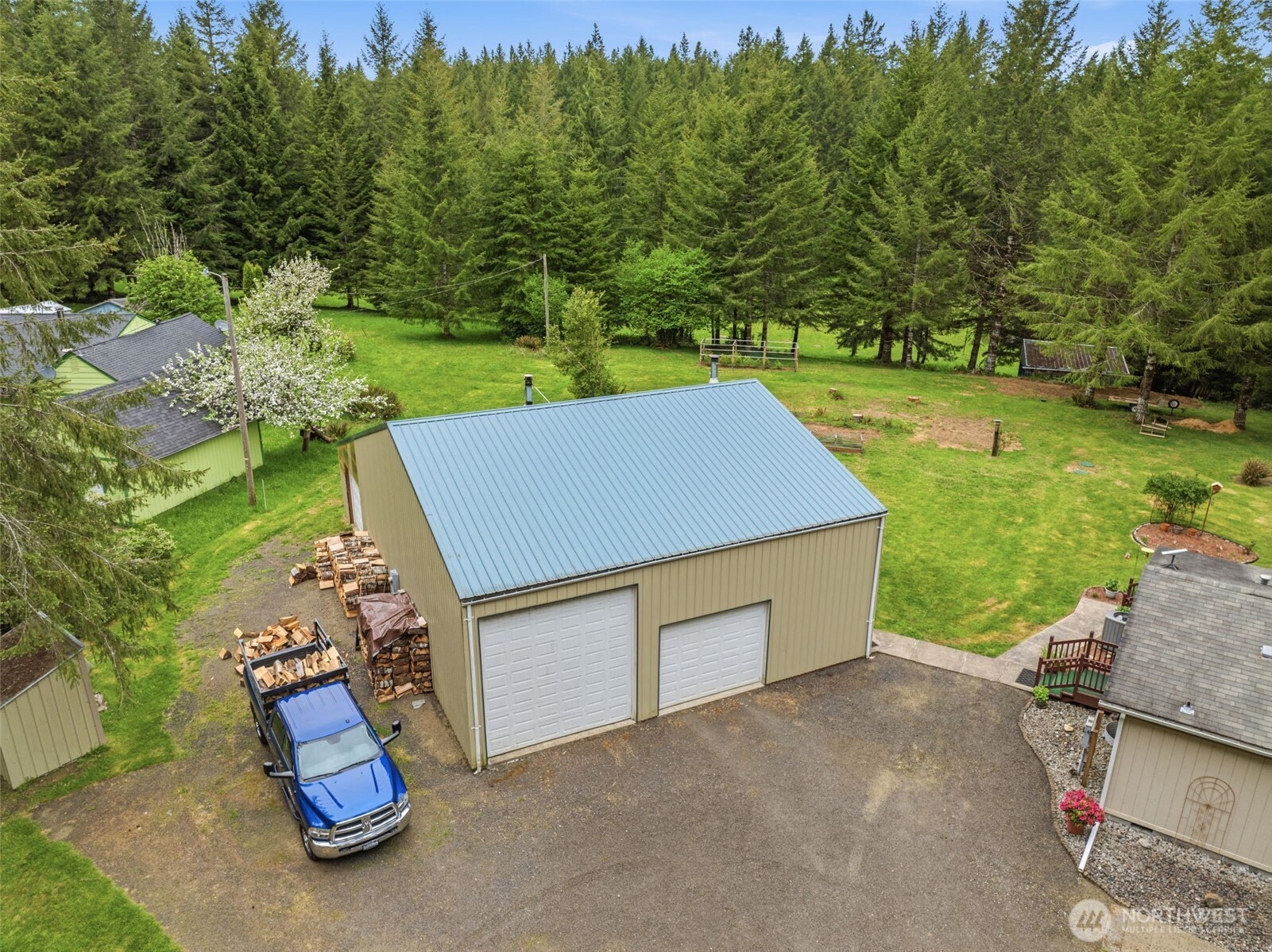 1047 Beaver Creek Road Cathlamet, WA 98612 - Photo 29 of 39 an aerial view of a house with backyard space and pool