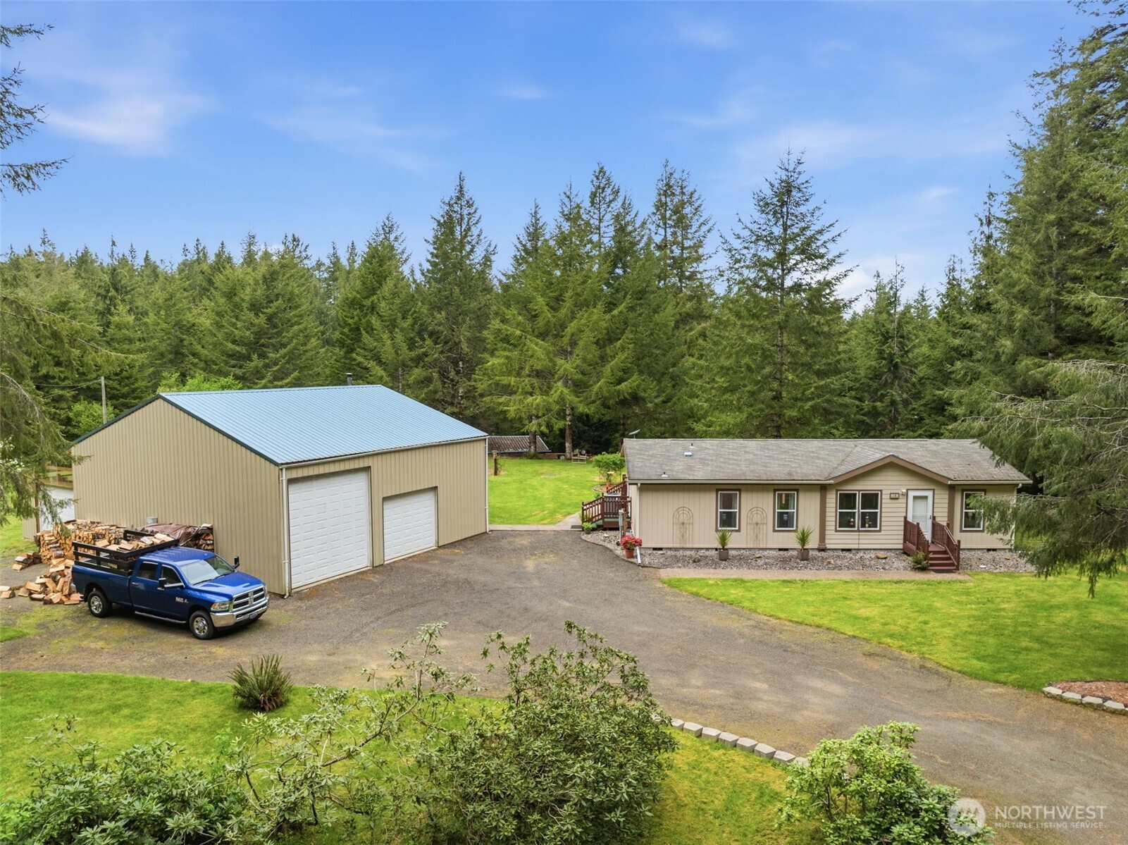 1047 Beaver Creek Road Cathlamet, WA 98612 - Photo 30 of 39 a front view of a house with garden