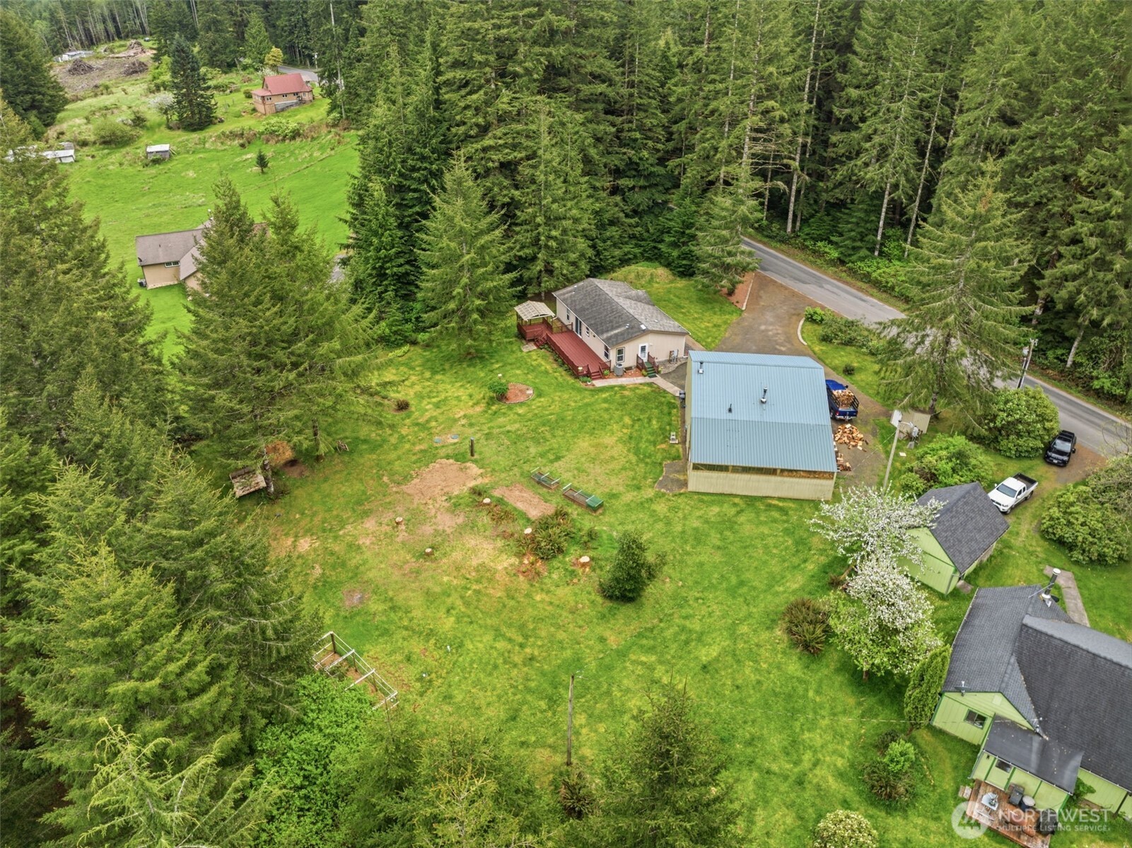 1047 Beaver Creek Road Cathlamet, WA 98612 - Photo 36 of 39 an aerial view of residential house with outdoor space and trees all around