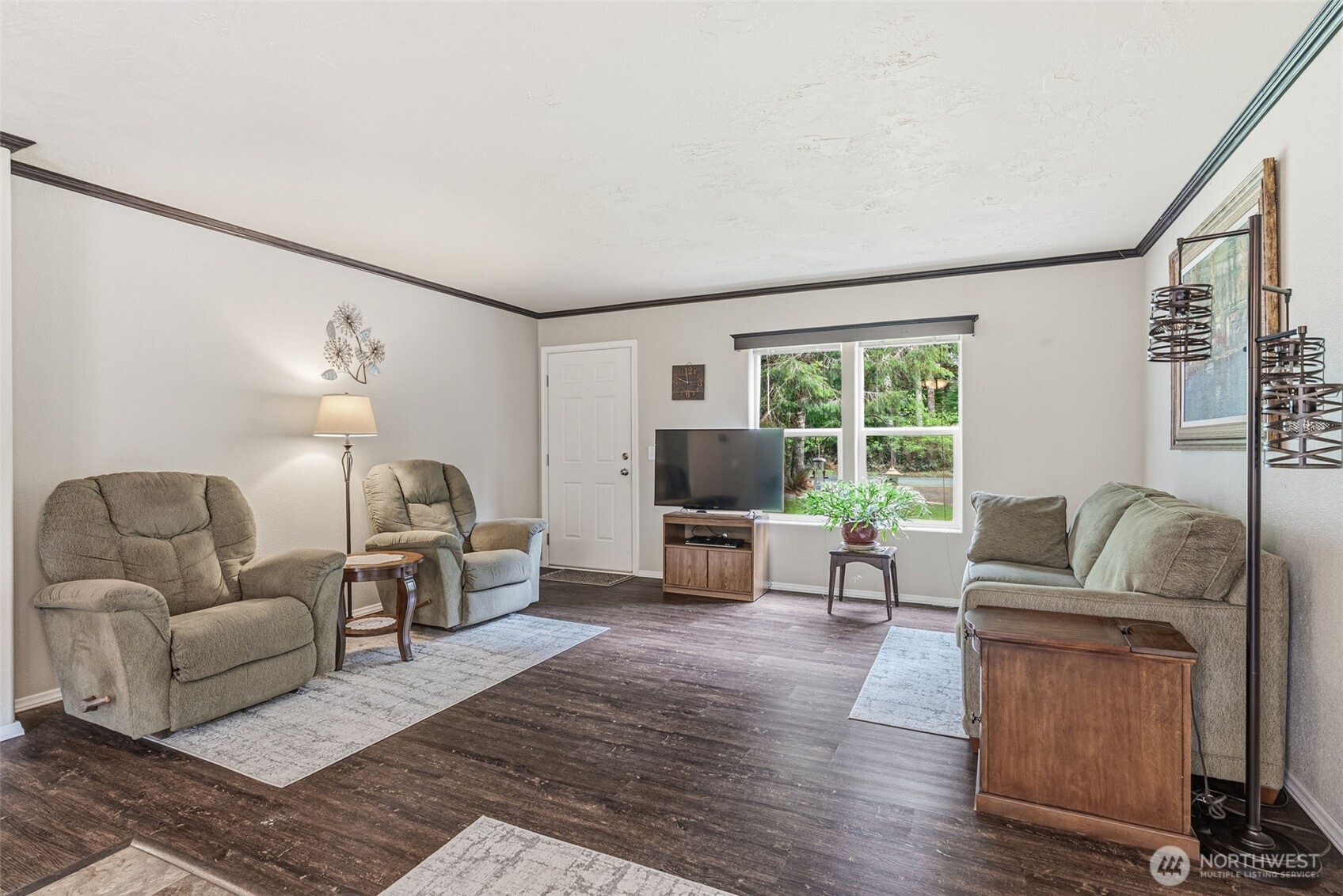 1047 Beaver Creek Road Cathlamet, WA 98612 - Photo 5 of 39 a living room with furniture and a flat screen tv