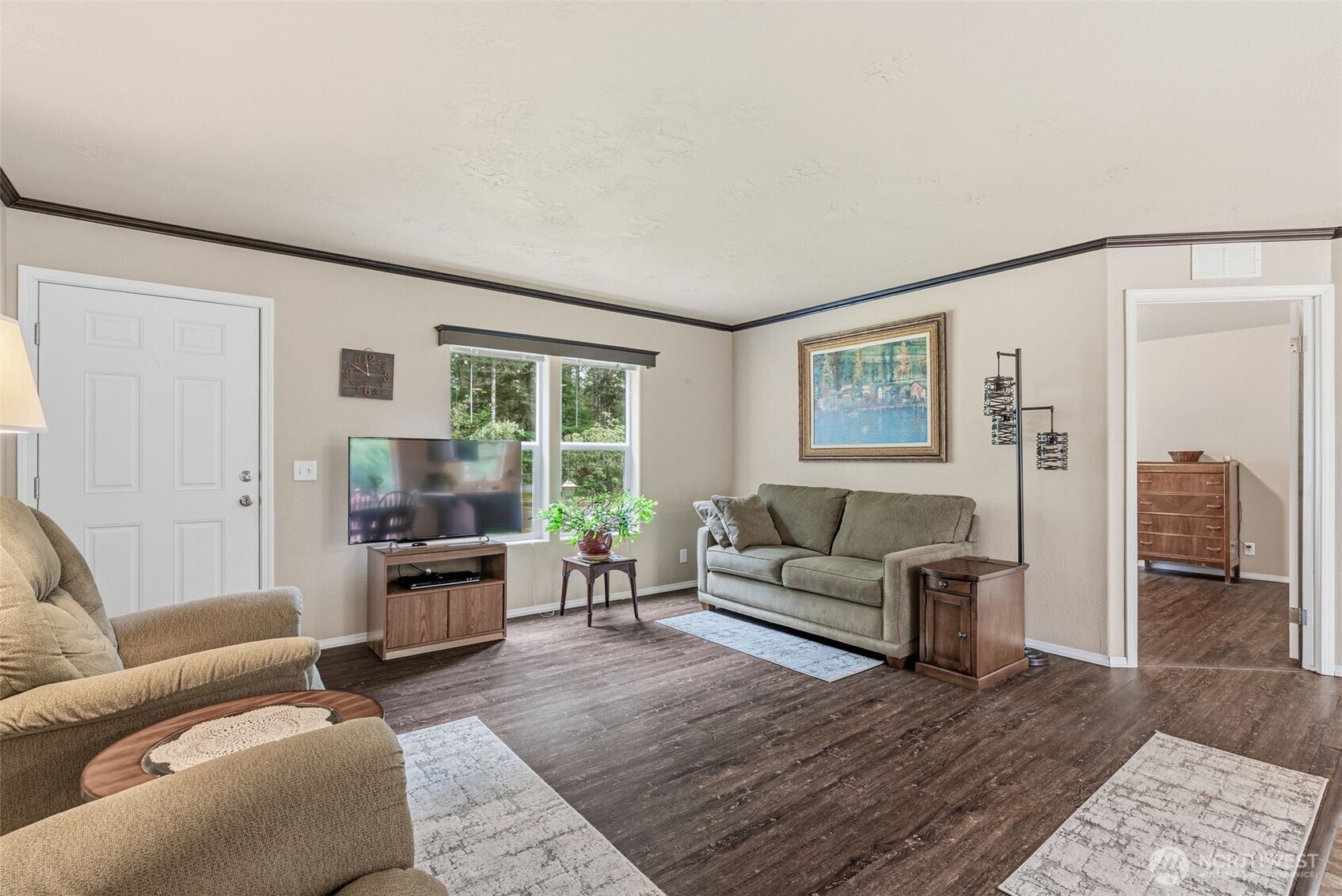 1047 Beaver Creek Road Cathlamet, WA 98612 - Photo 7 of 39 a living room with furniture and a flat screen tv