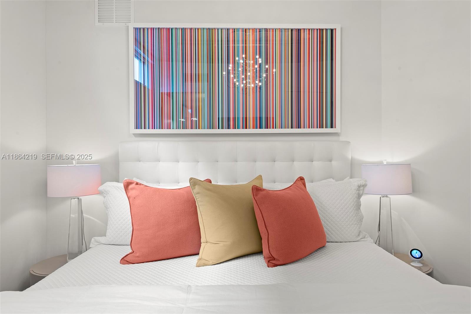 1700 Meridian Avenue, Unit 307 Miami Beach, FL 33139 - Photo 25 of 32 a bedroom with a bed and window