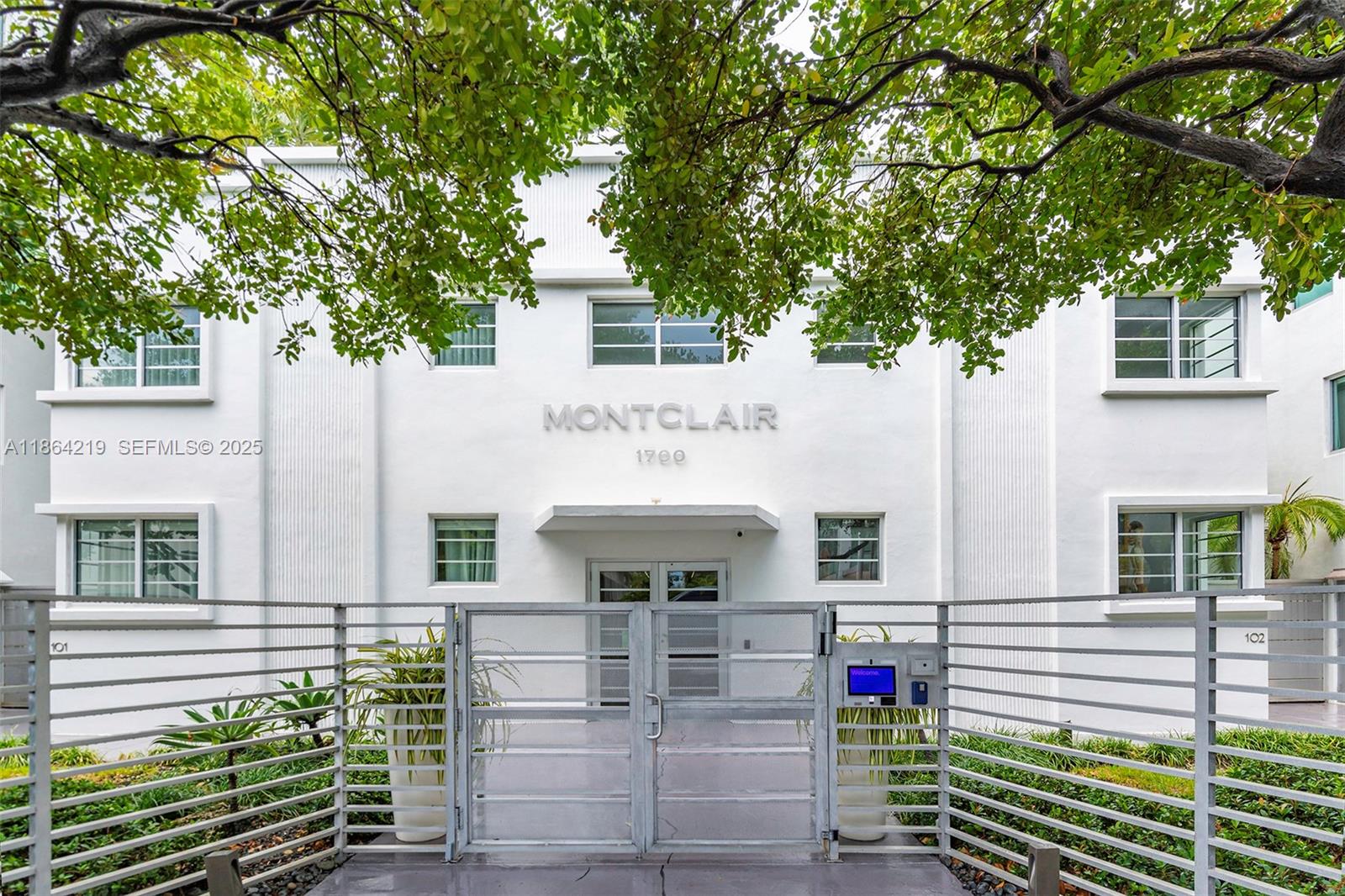 1700 Meridian Avenue, Unit 307 Miami Beach, FL 33139 - Photo 4 of 32 a front view of a house with plants