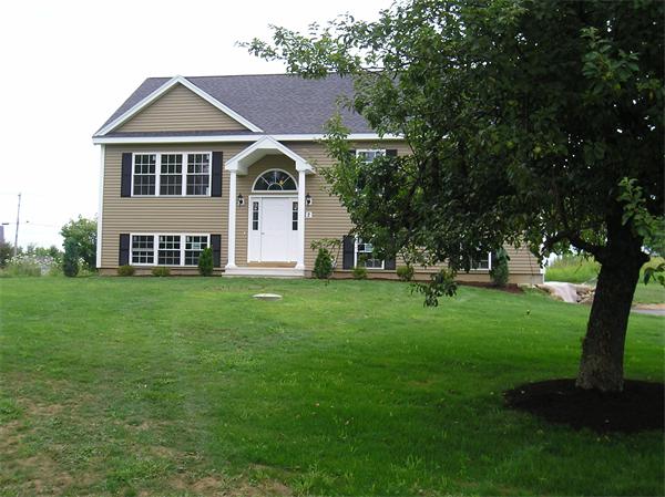 2 Bell Road North Brookfield, MA 01535 - Photo 11 of 27 a front view of a house with a yard