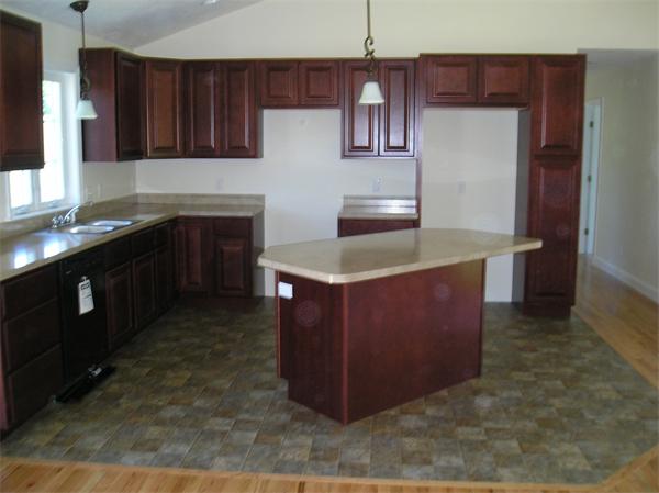 2 Bell Road North Brookfield, MA 01535 - Photo 20 of 27 a kitchen with stainless steel appliances granite countertop a sink and a stove top oven