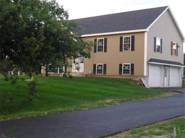 2 Bell Road North Brookfield, MA 01535 - Photo 4 of 27 a house view with a garden space
