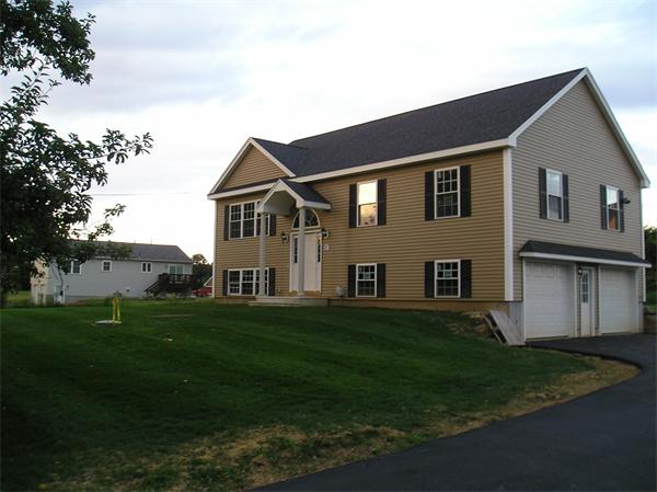 2 Bell Road North Brookfield, MA 01535 - Photo 5 of 27 a front view of a house with a garden