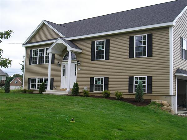 2 Bell Road North Brookfield, MA 01535 - Photo 9 of 27 a front view of a house with a garden