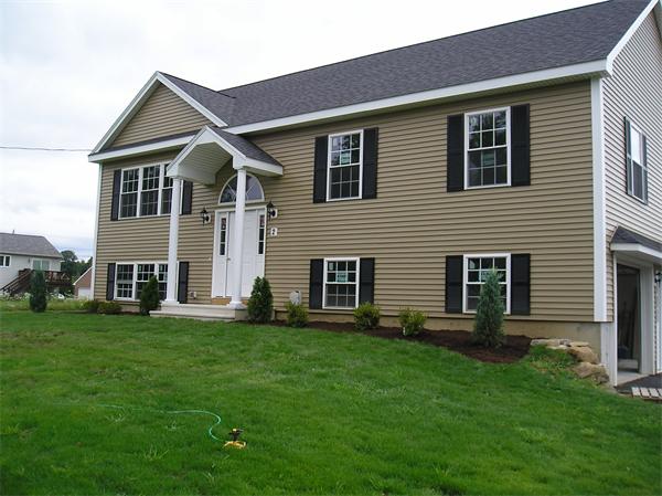 2 Bell Road North Brookfield, MA 01535 - Photo 10 of 27 a front view of a house with a garden