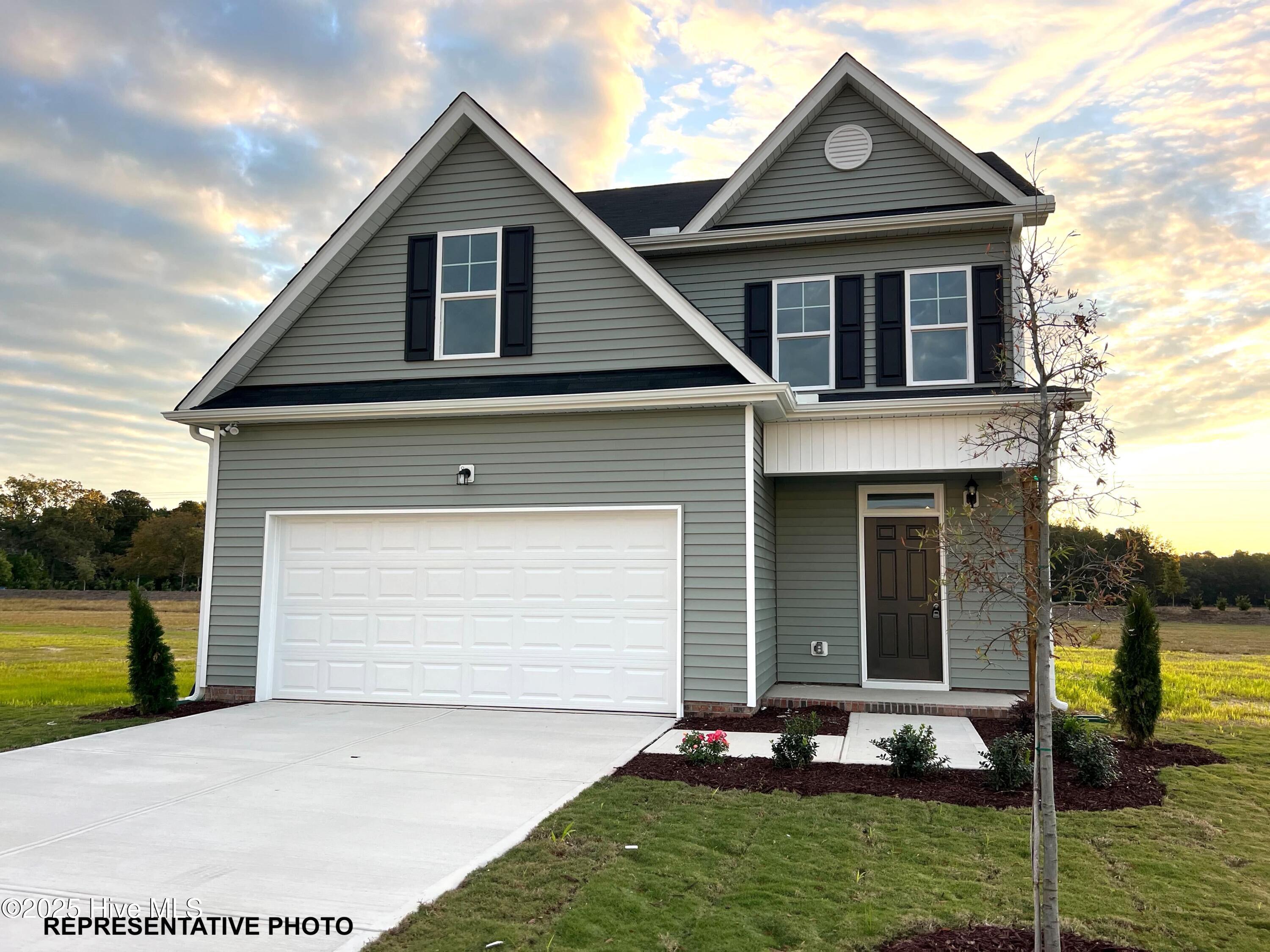 588 Springtooth Drive Zebulon, NC 27597 - Photo 1 of 8 Representative Photo - Finishes Will Vary