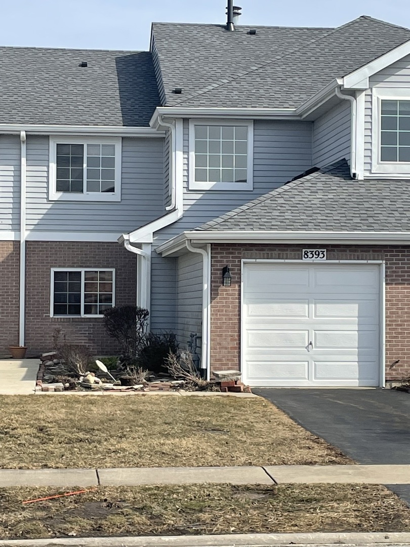 8393 Mystic Darien, IL 60561 - Photo 1 of 21 a front view of a house with a yard