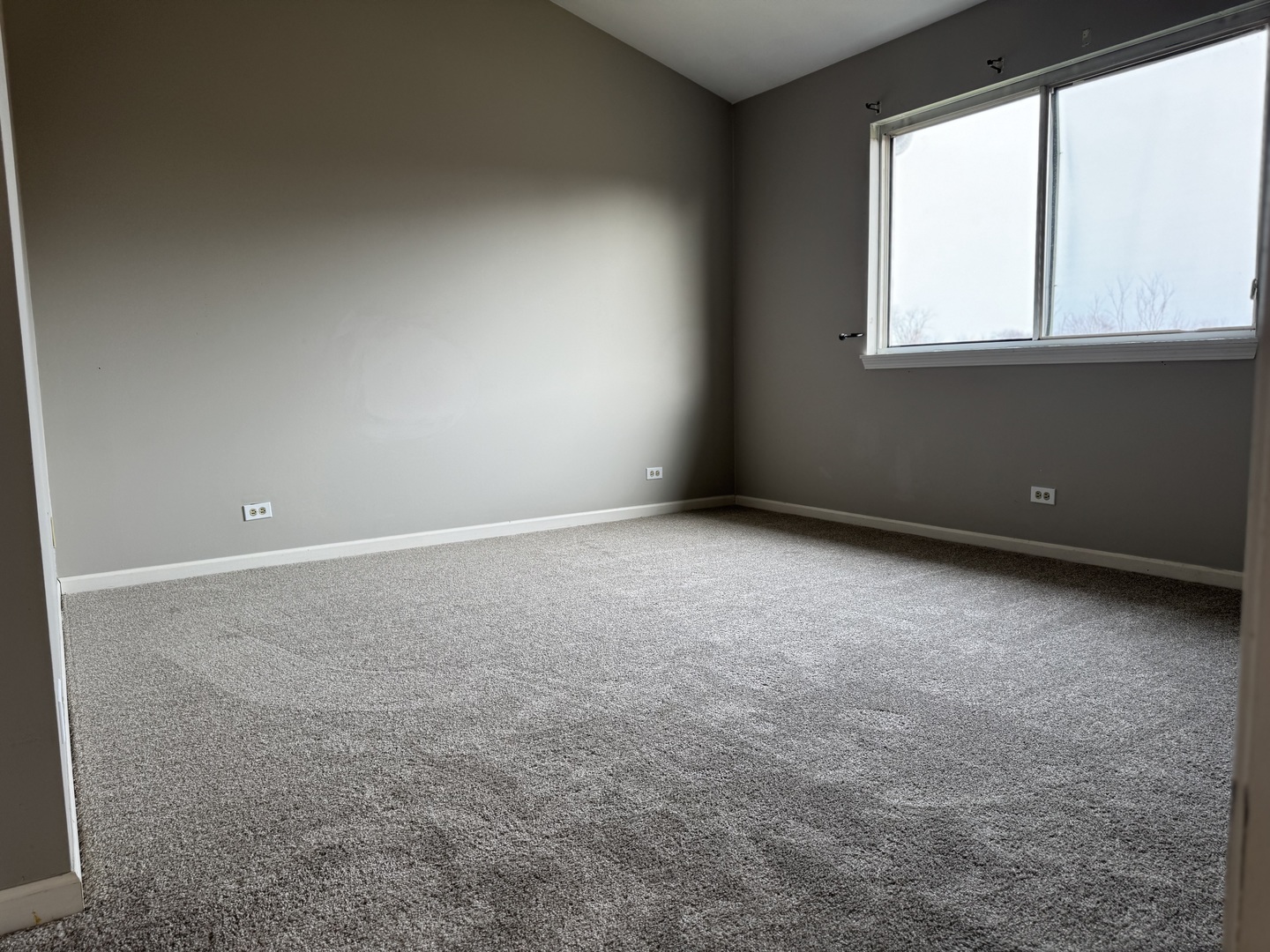 8393 Mystic Darien, IL 60561 - Photo 12 of 21 an empty room with a window