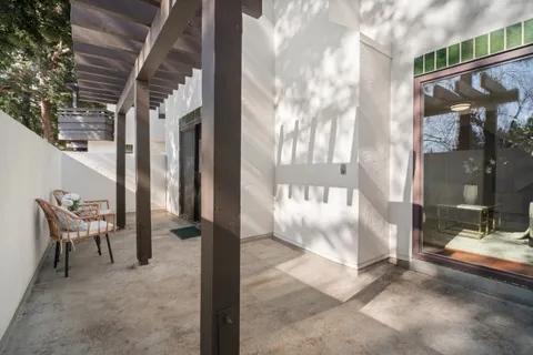a view of a porch with a bench