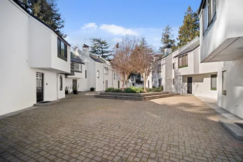 a view of a street with a building