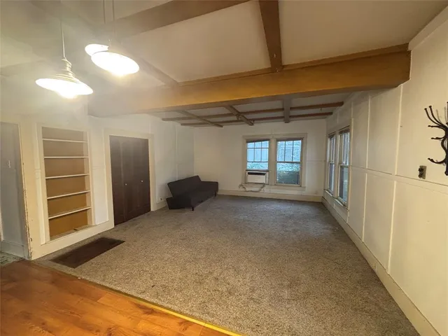 a view of entryway and hall with a window