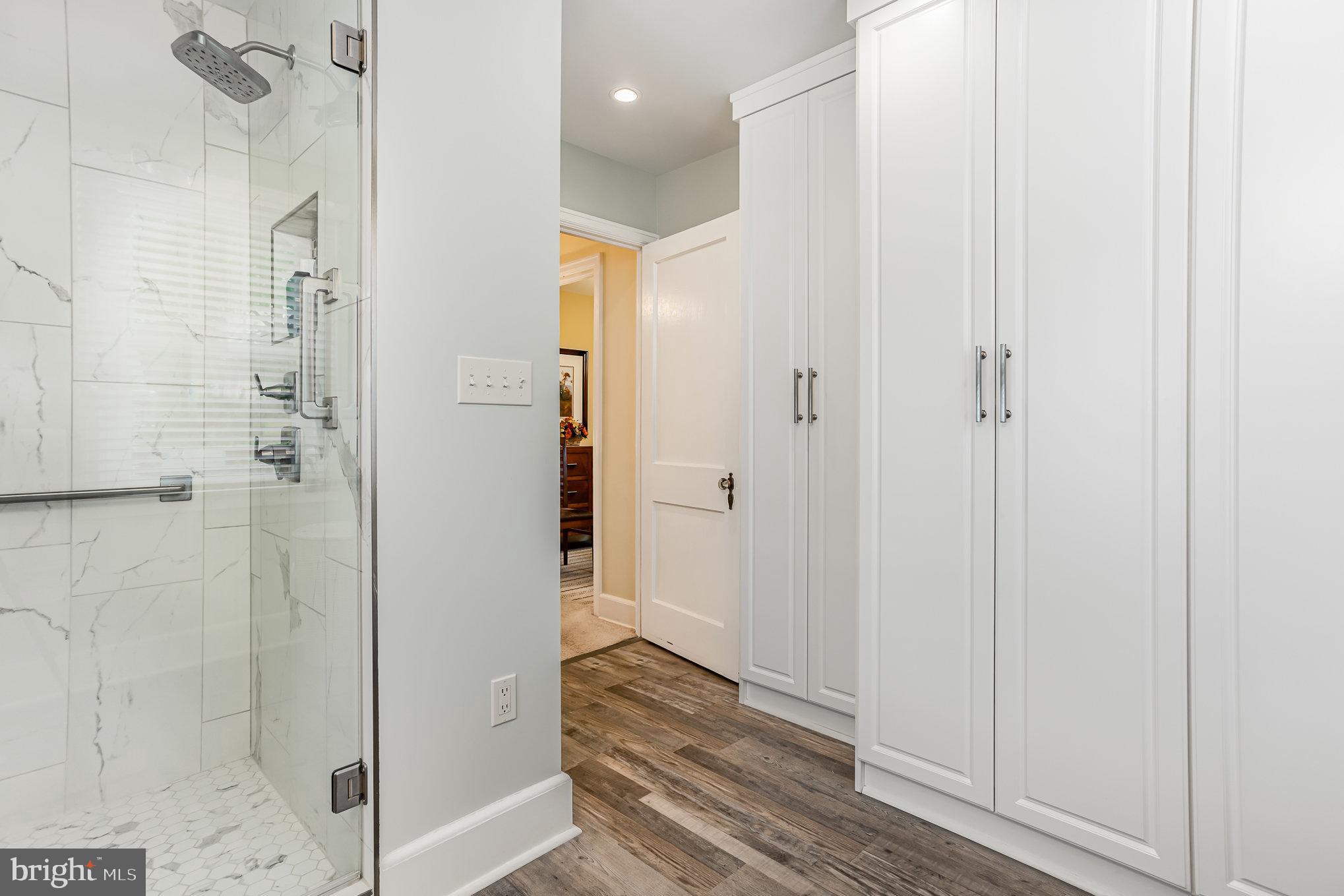 29 Maple Avenue Hershey, PA 17033 - Photo 17 of 32 a bathroom with a glass shower door