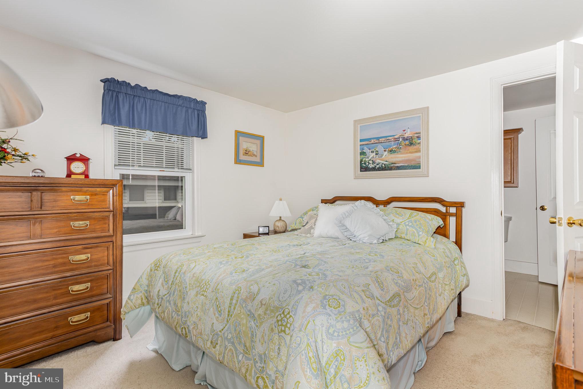 29 Maple Avenue Hershey, PA 17033 - Photo 19 of 32 a bedroom with a bed and a dresser