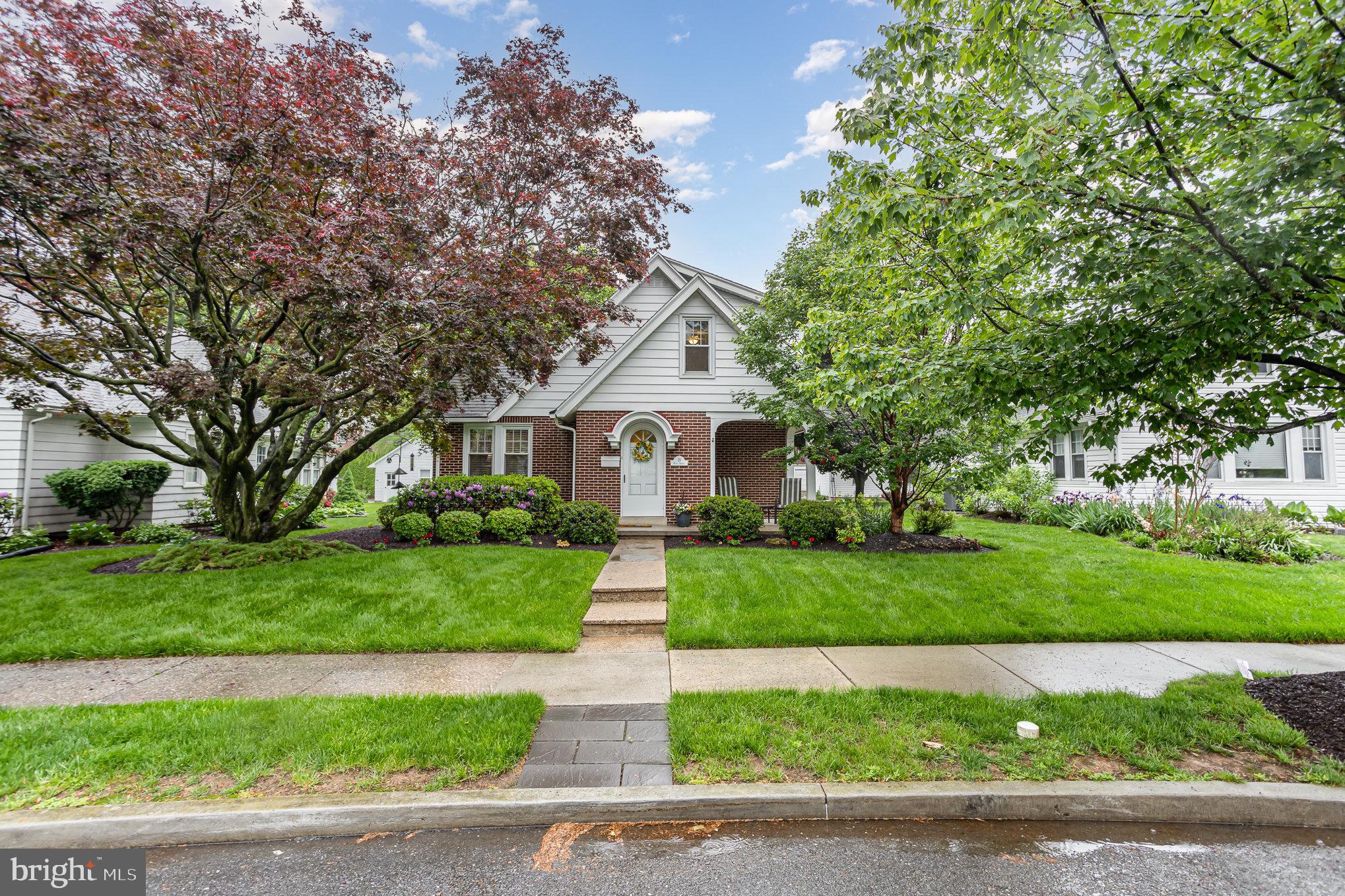 29 Maple Avenue Hershey, PA 17033 - Photo 2 of 32 a front view of a house with a yard