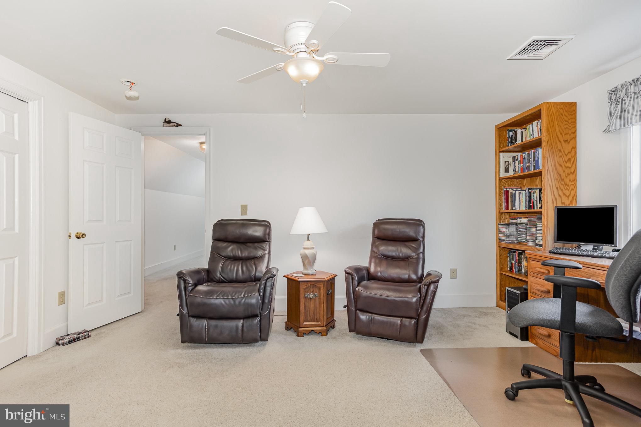 29 Maple Avenue Hershey, PA 17033 - Photo 21 of 32 a living room with furniture and a flat screen tv
