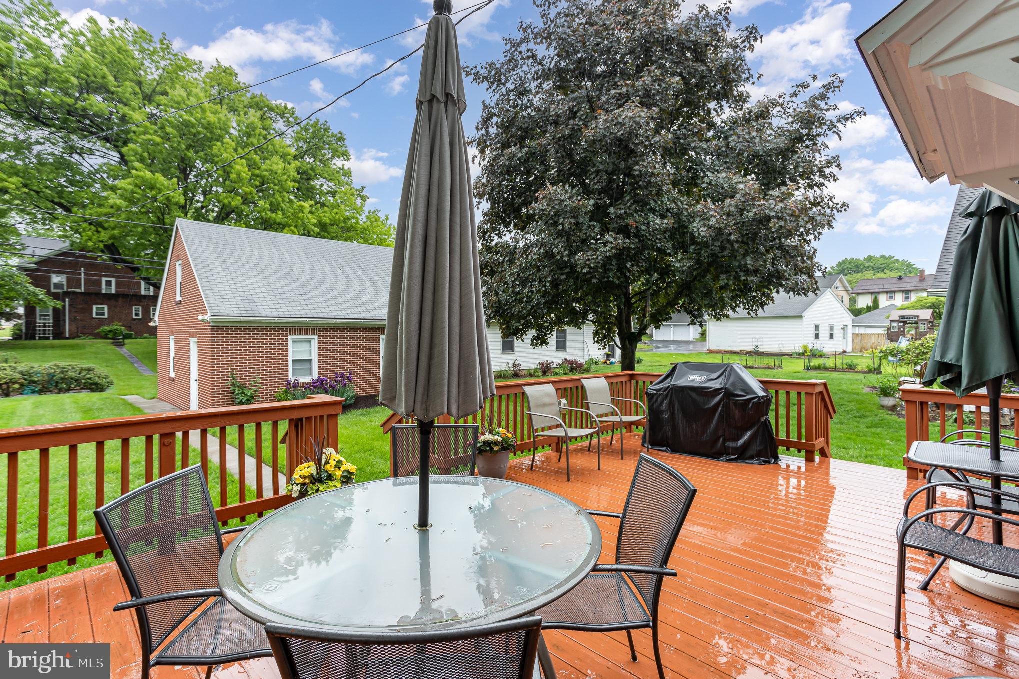 29 Maple Avenue Hershey, PA 17033 - Photo 25 of 32 a view of a chairs and table in patio with a swimming pool