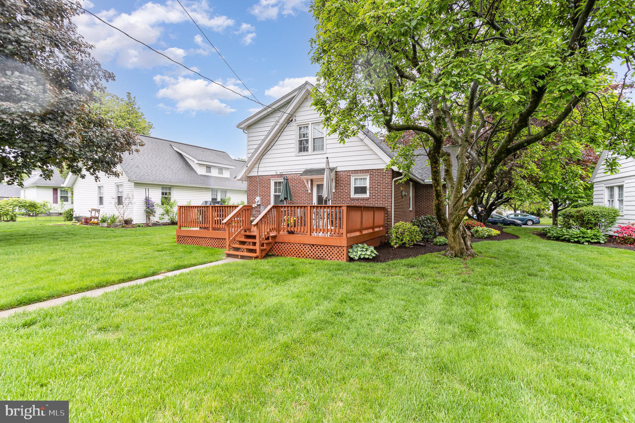 29 Maple Avenue Hershey, PA 17033 - Photo 28 of 32 a view of a house with a big yard and large trees