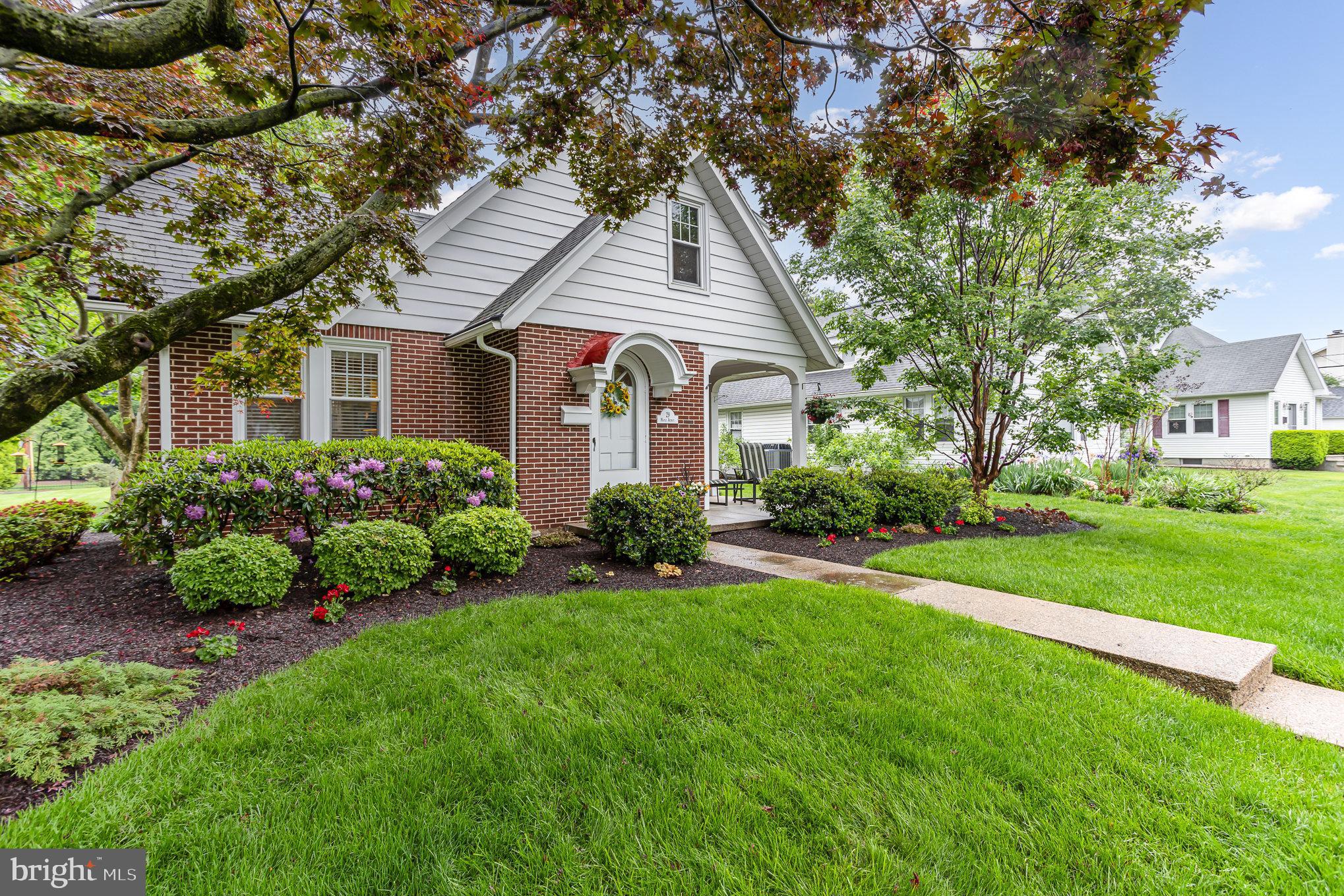 29 Maple Avenue Hershey, PA 17033 - Photo 3 of 32 a front view of a house with a yard