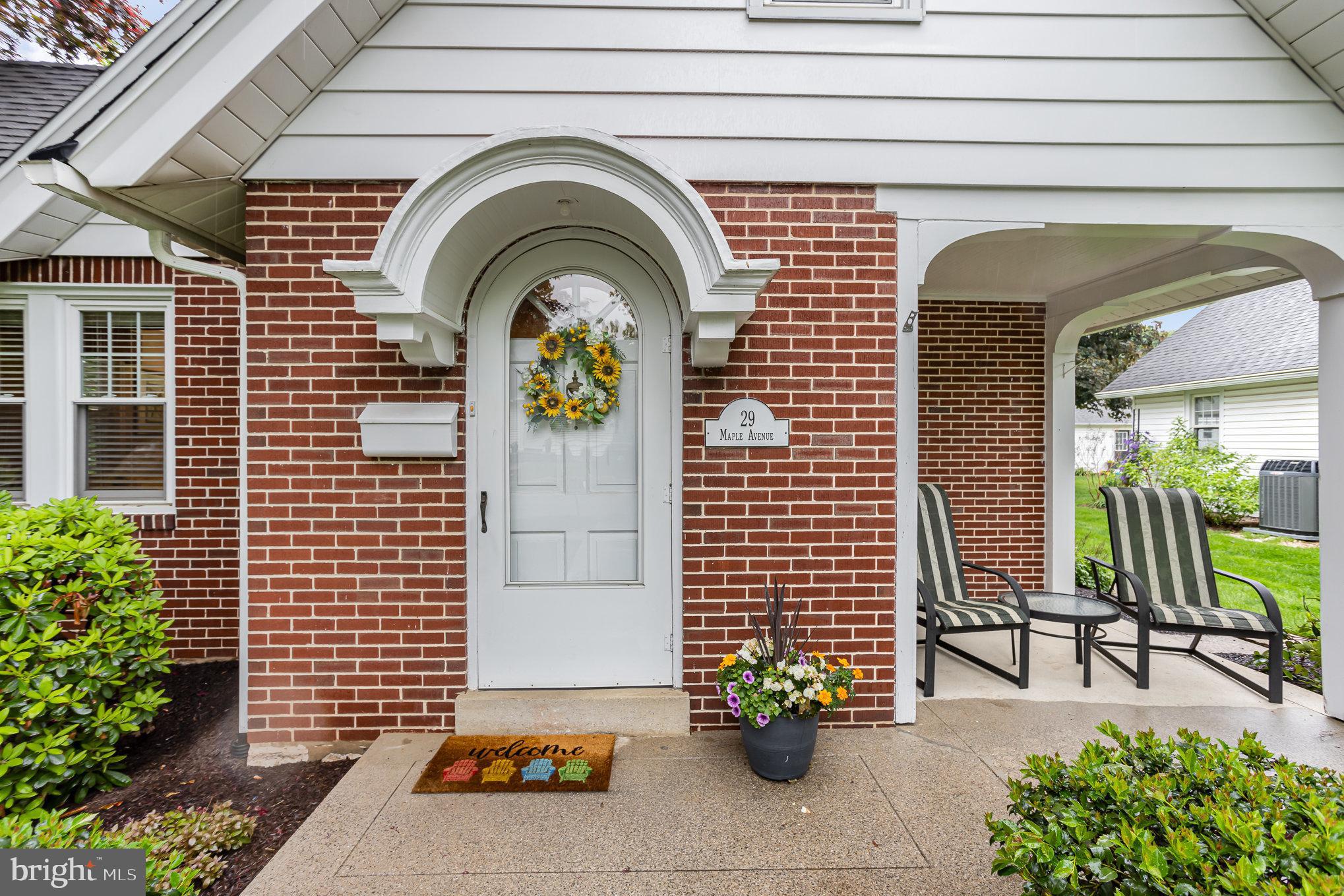 29 Maple Avenue Hershey, PA 17033 - Photo 5 of 32 a front view of a house with potted plants