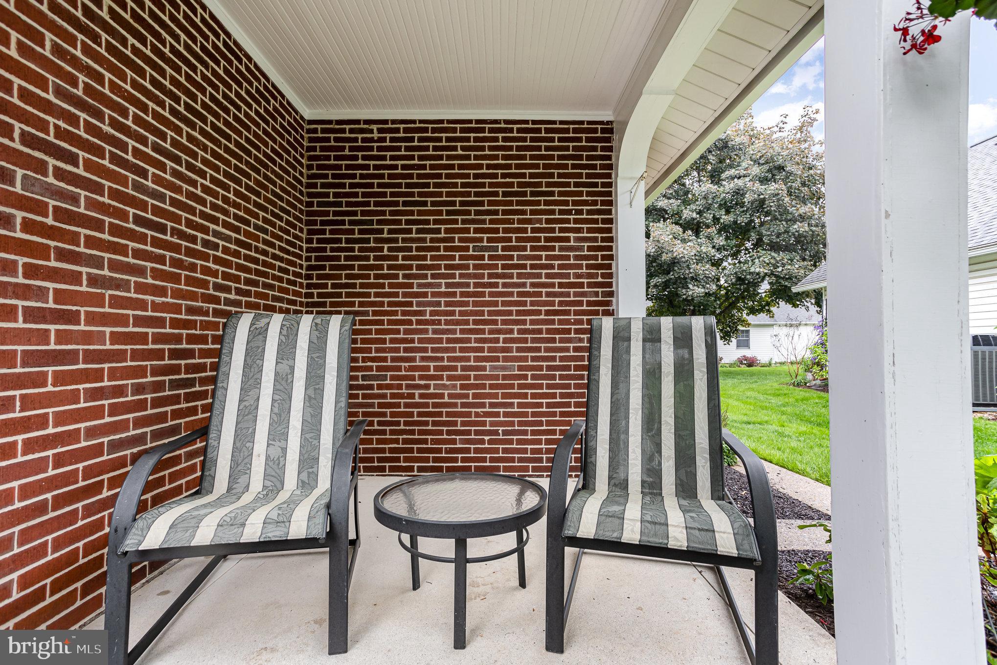 29 Maple Avenue Hershey, PA 17033 - Photo 6 of 32 a view of a room with wooden floor and chair