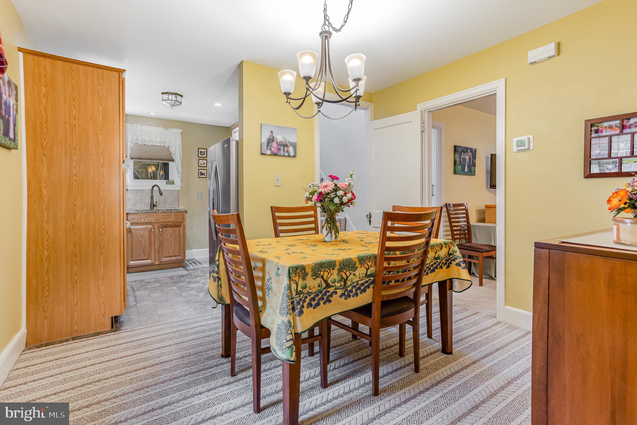 29 Maple Avenue Hershey, PA 17033 - Photo 10 of 32 a view of a dining room with furniture and wooden floor