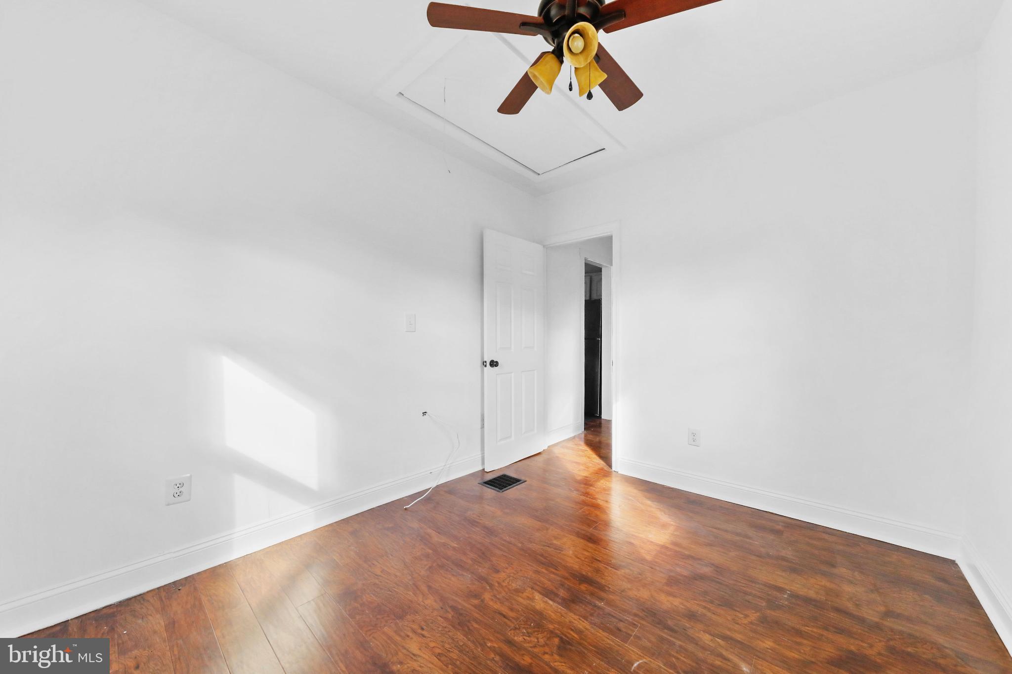 323 3rd Avenue Lindenwold, NJ 08021 - Photo 17 of 34 Bright and airy room with wooden floors.