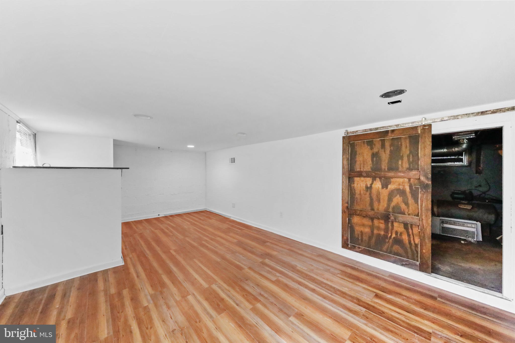 323 3rd Avenue Lindenwold, NJ 08021 - Photo 18 of 34 Spacious basement with rustic charm.