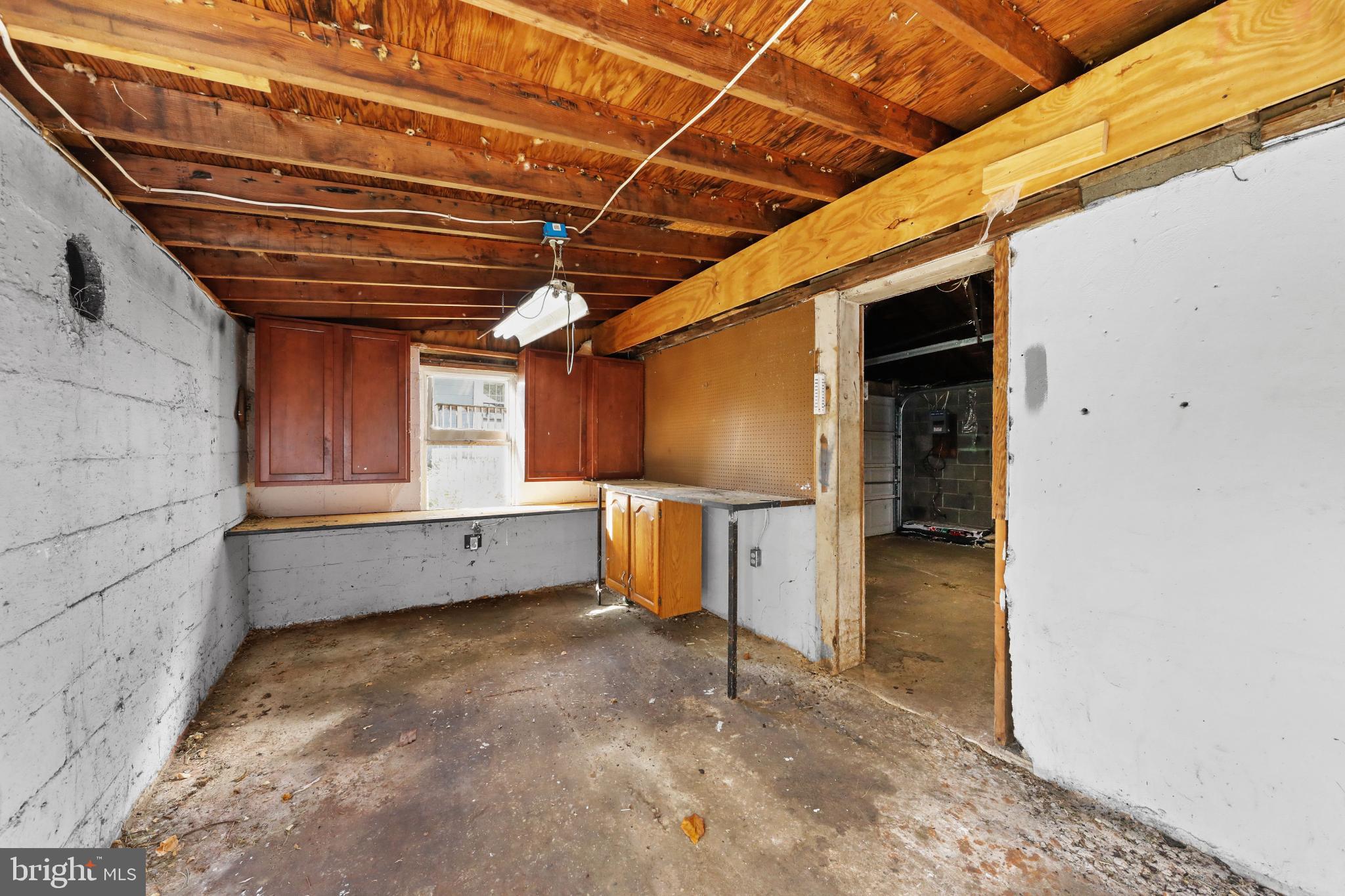323 3rd Avenue Lindenwold, NJ 08021 - Photo 28 of 34 Spacious unfinished garage with potential.
