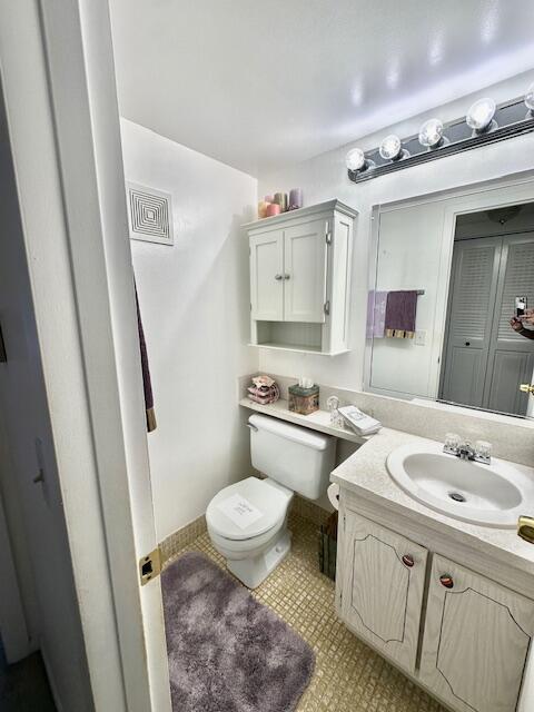 202 Brighton East Boca Raton, FL 33434 - Photo 7 of 37 a bathroom with a sink toilet and shower